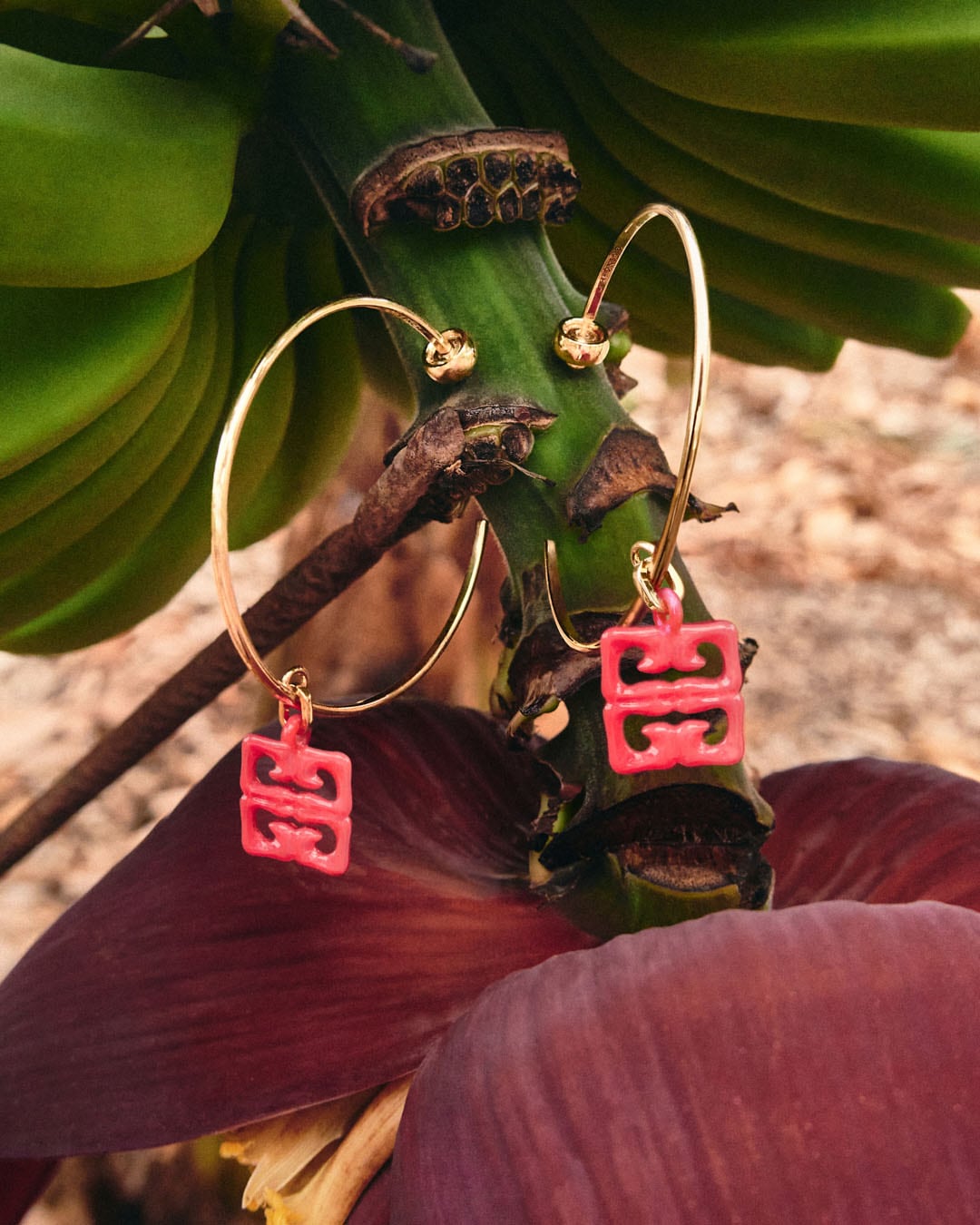 4G Liquid earrings in metal and resin