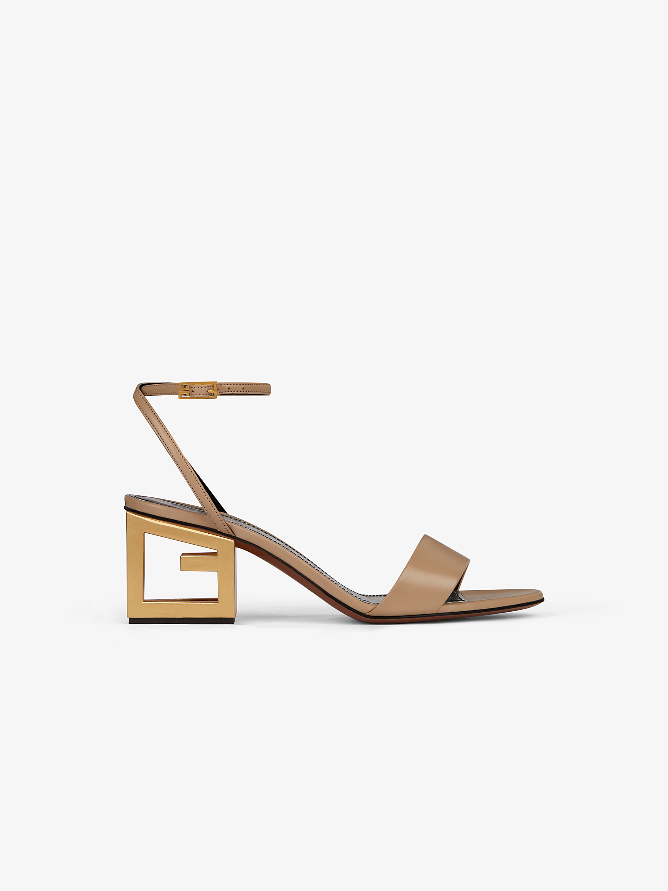 Gold G heel sandals in leather