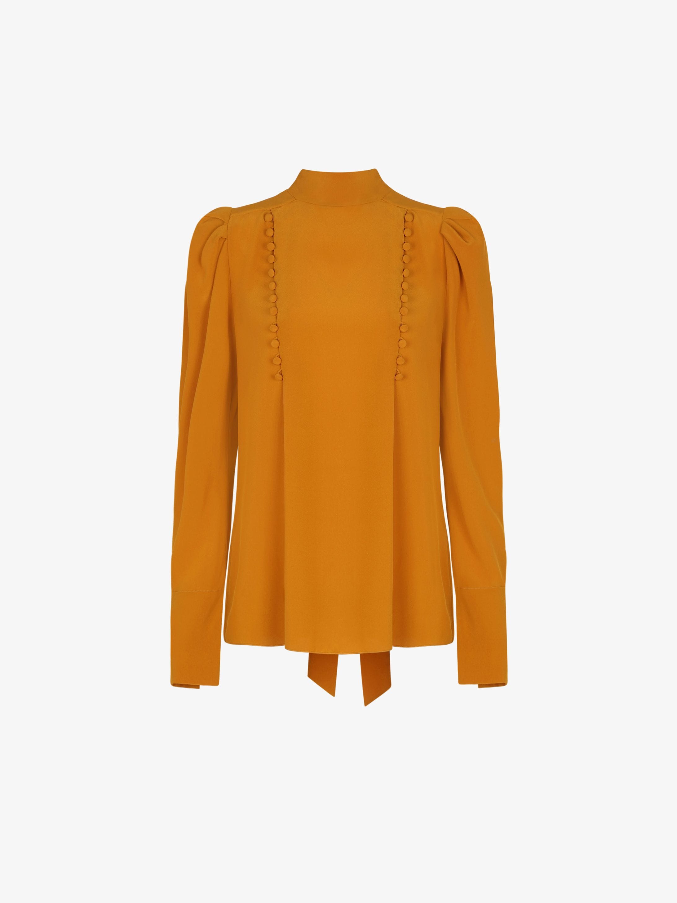 Blouse in silk with decorative buttons
