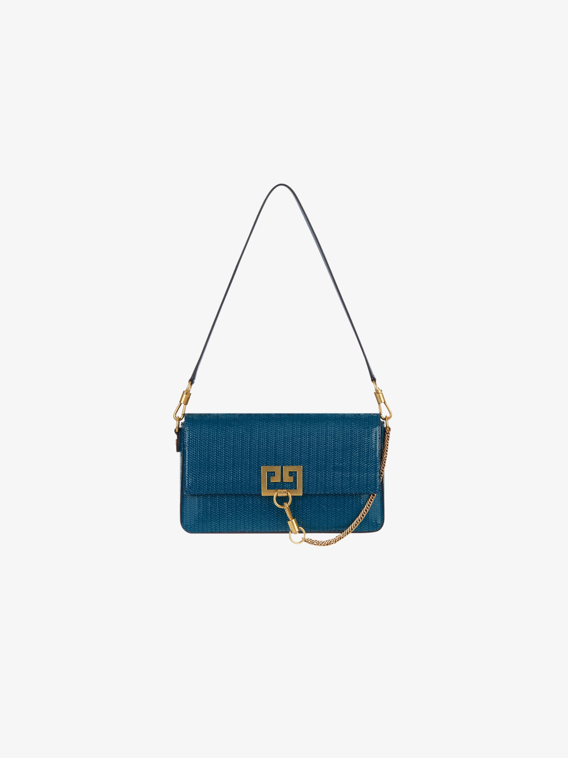 Snake effect Charm bag in laser cut leather