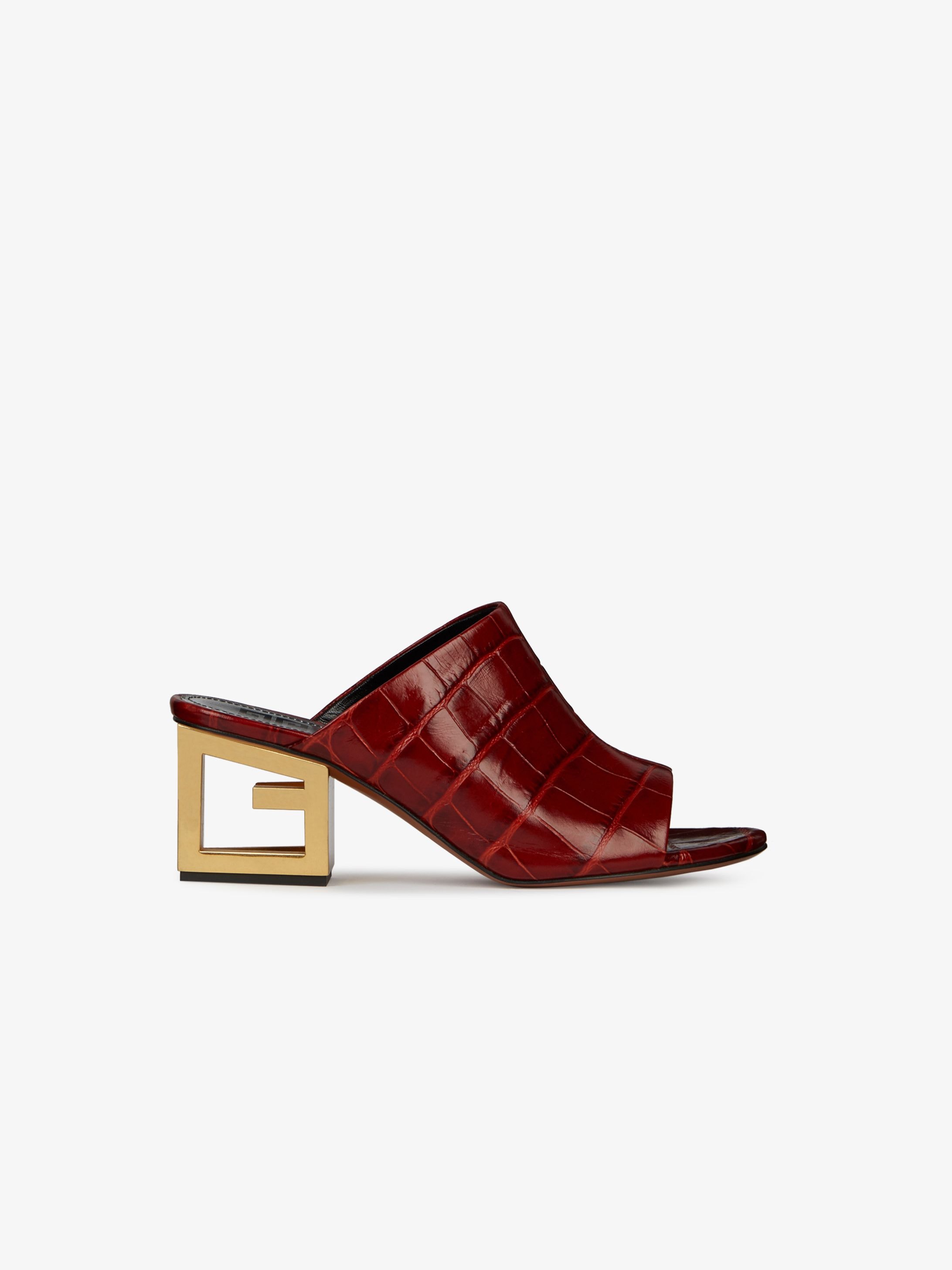 Mules in crocodile-effect leather with triangular G heel