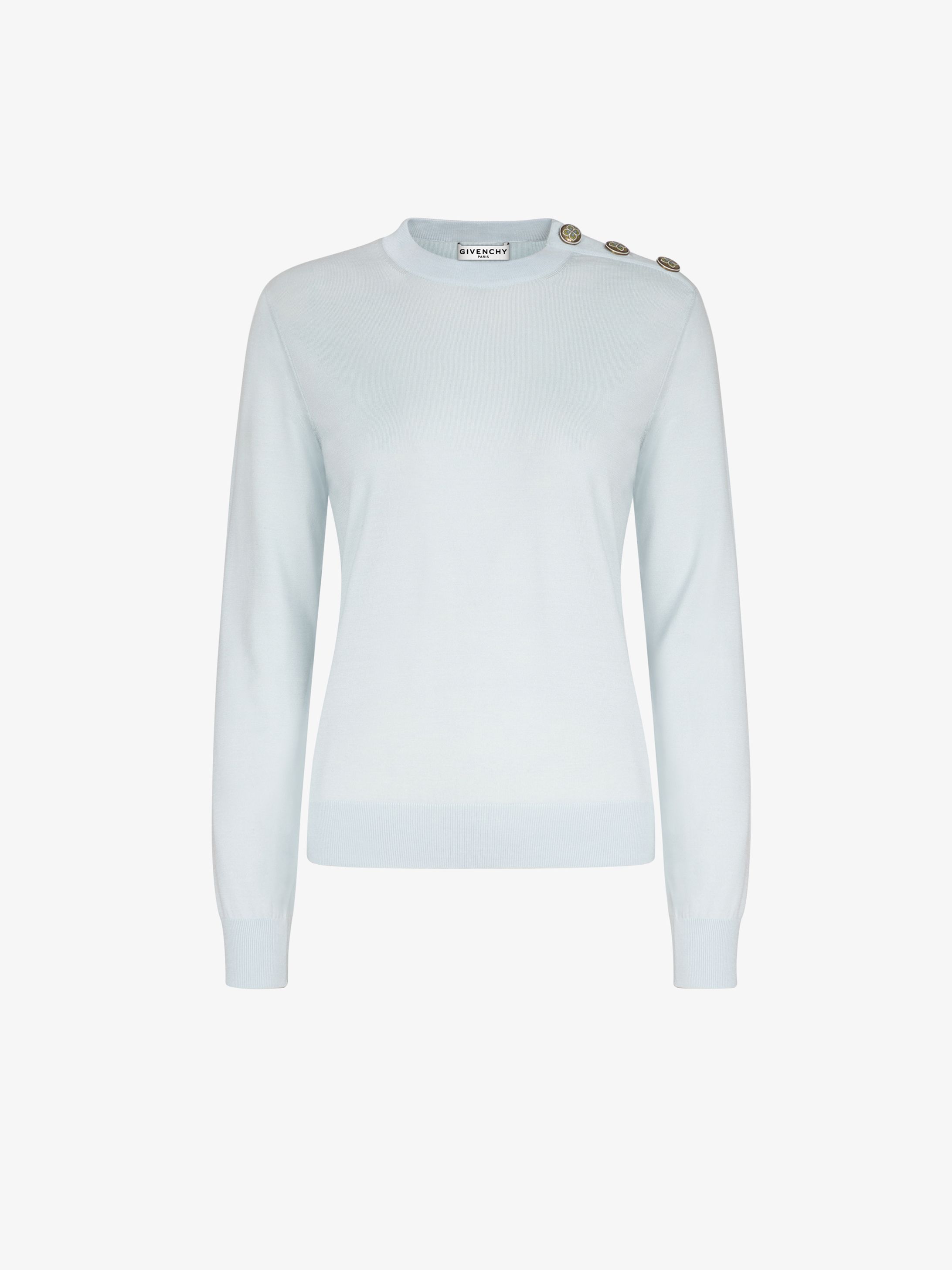 Pullover di lana con bottoni floreali