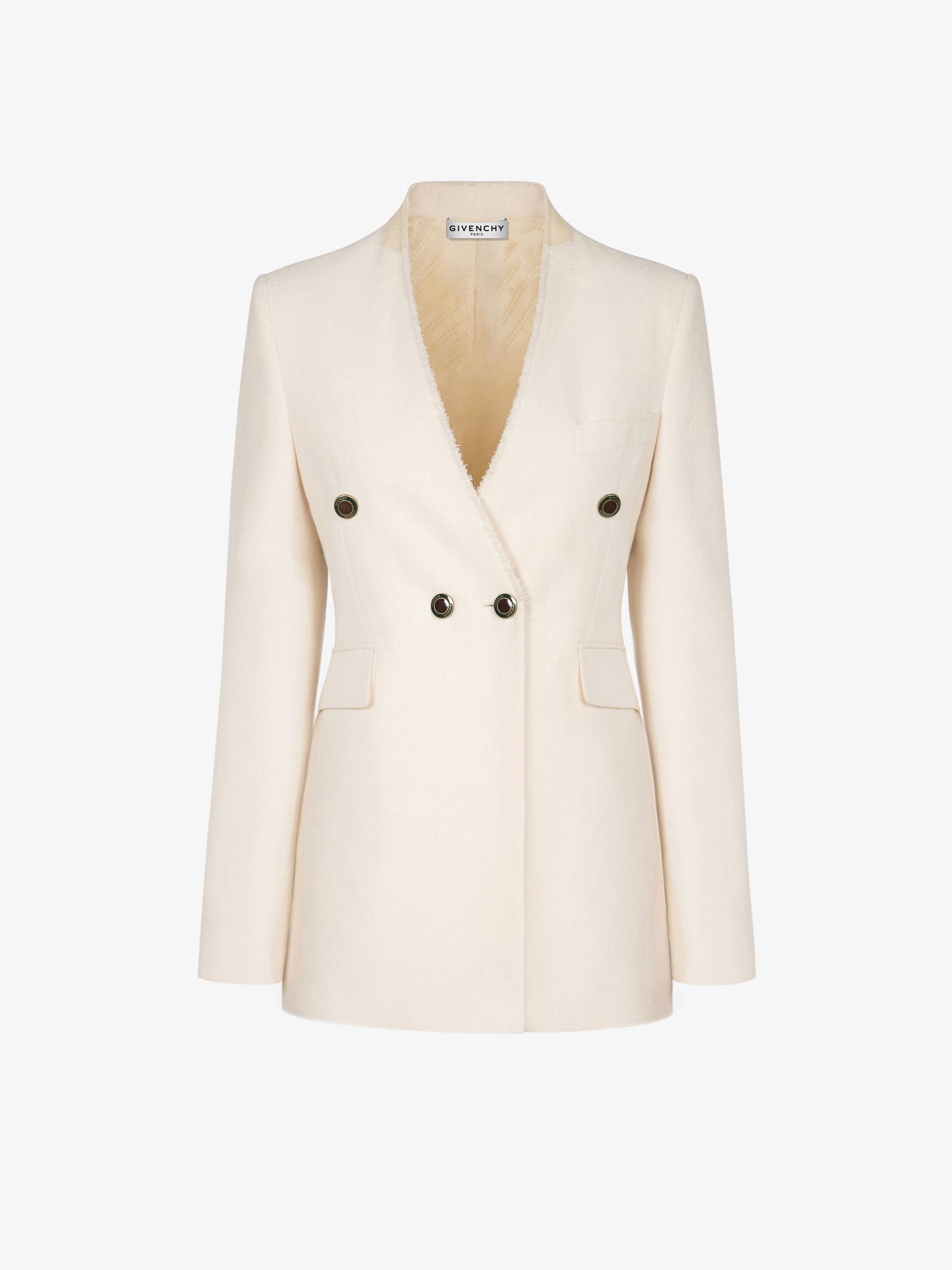 Double braisted collarless jacket with enamelled buttons