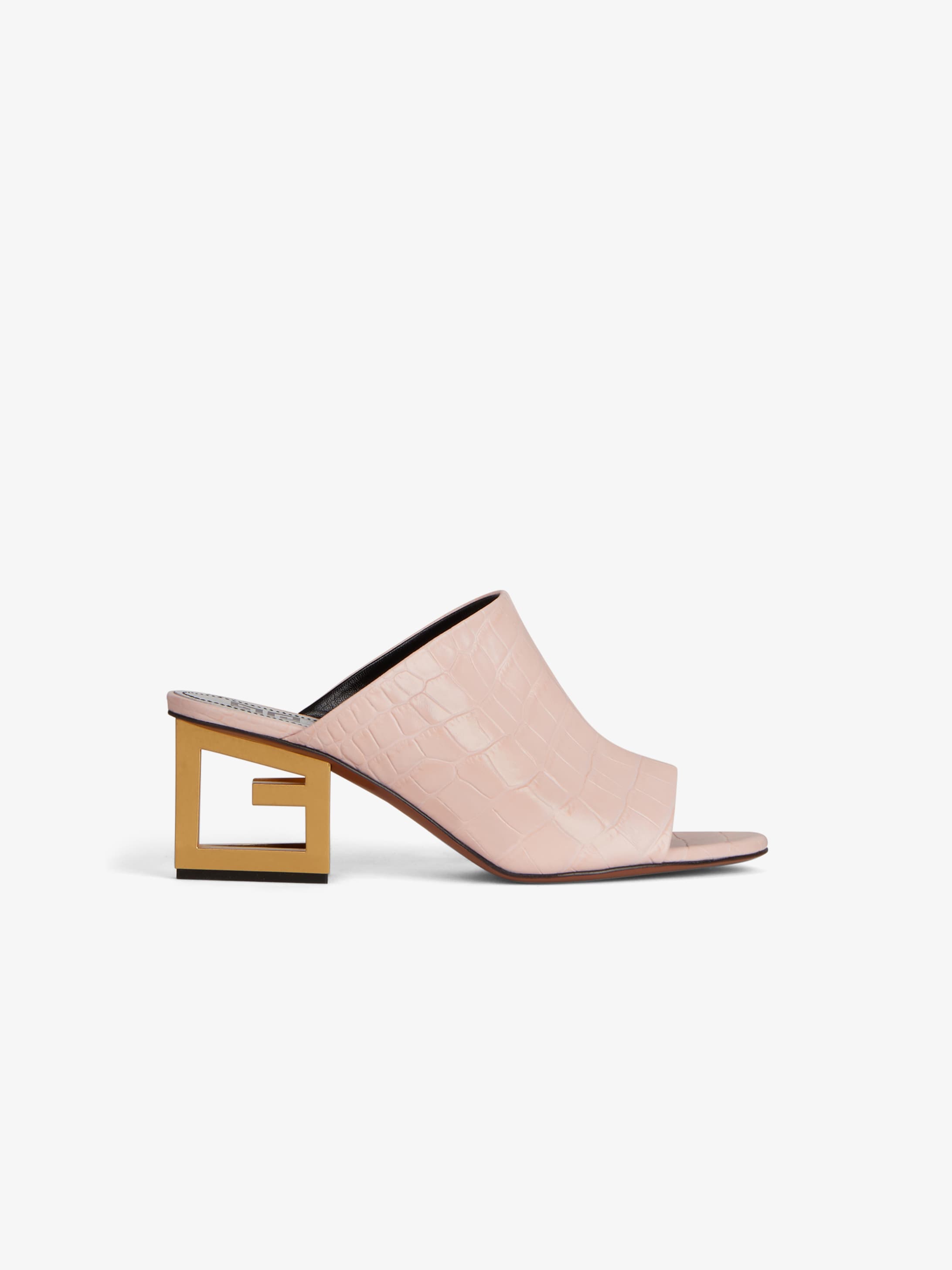 Sabot di pelle con tacco G triangolare