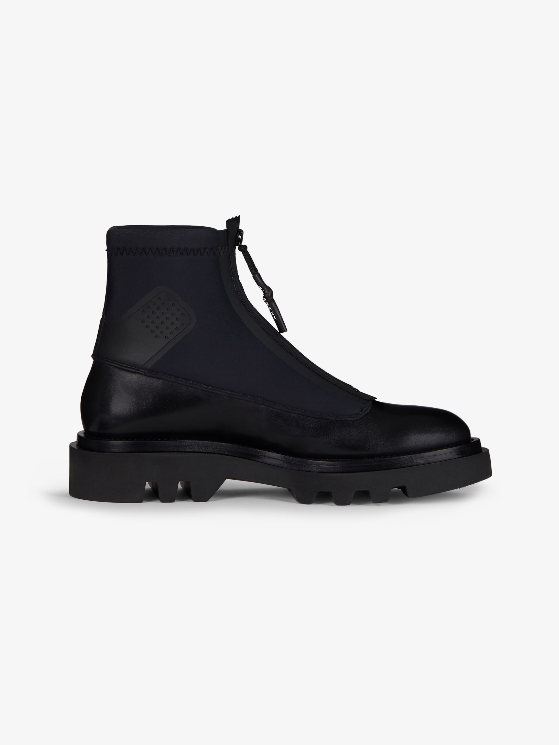 Combat boots in leather and neoprene 
