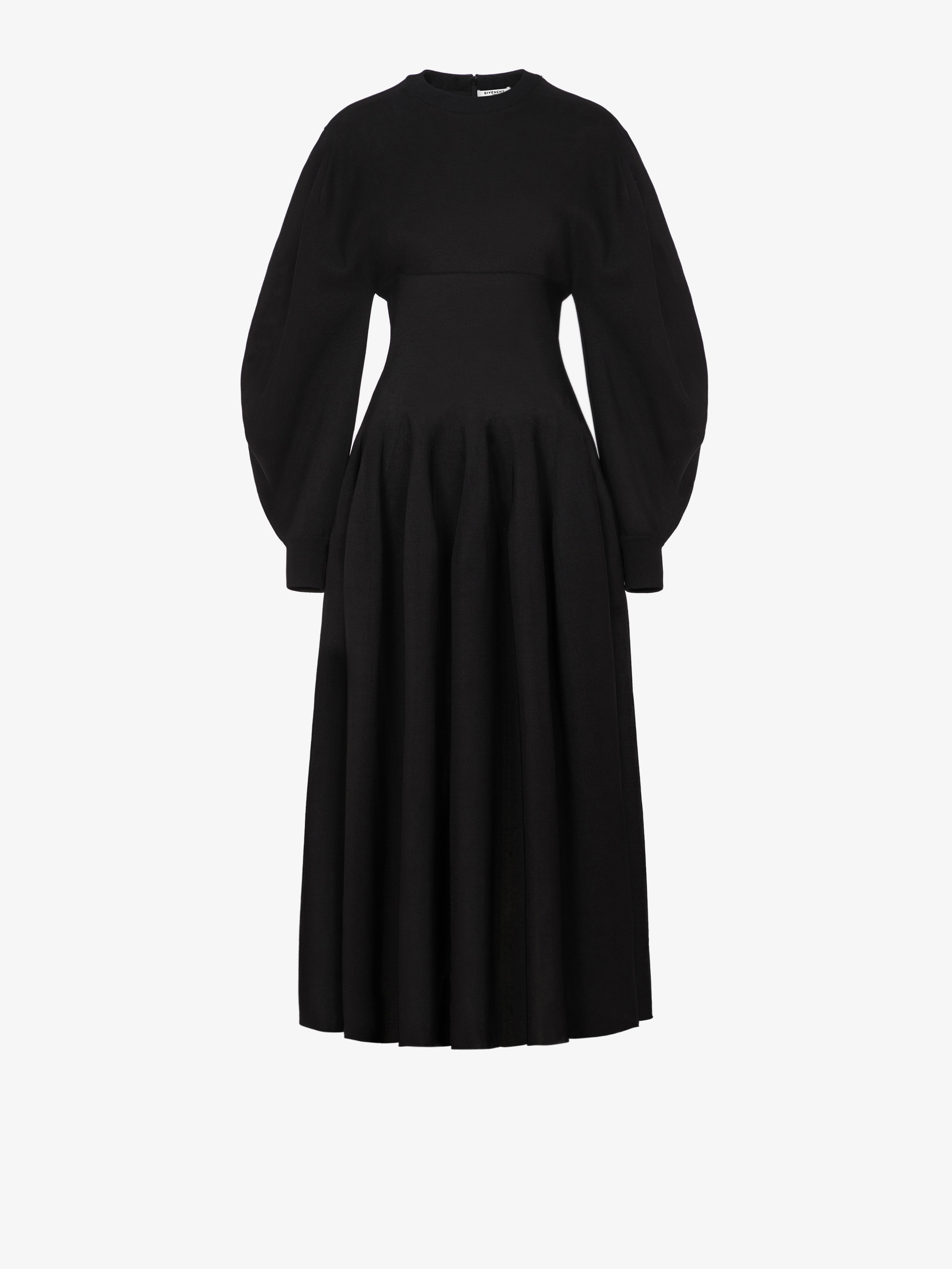 Robe mi-longue en maille à manches bouffantes