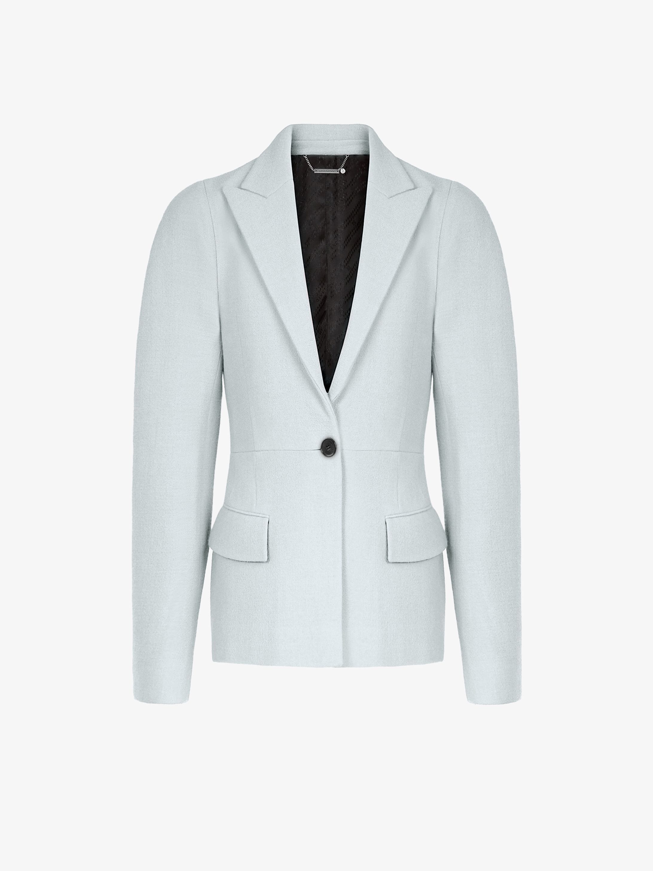 Peplum jacket in wool with curved shoulders